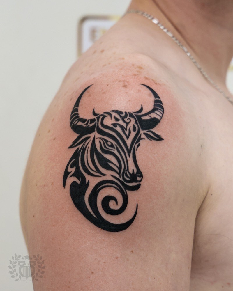 Bold geometric blackwork tattoo