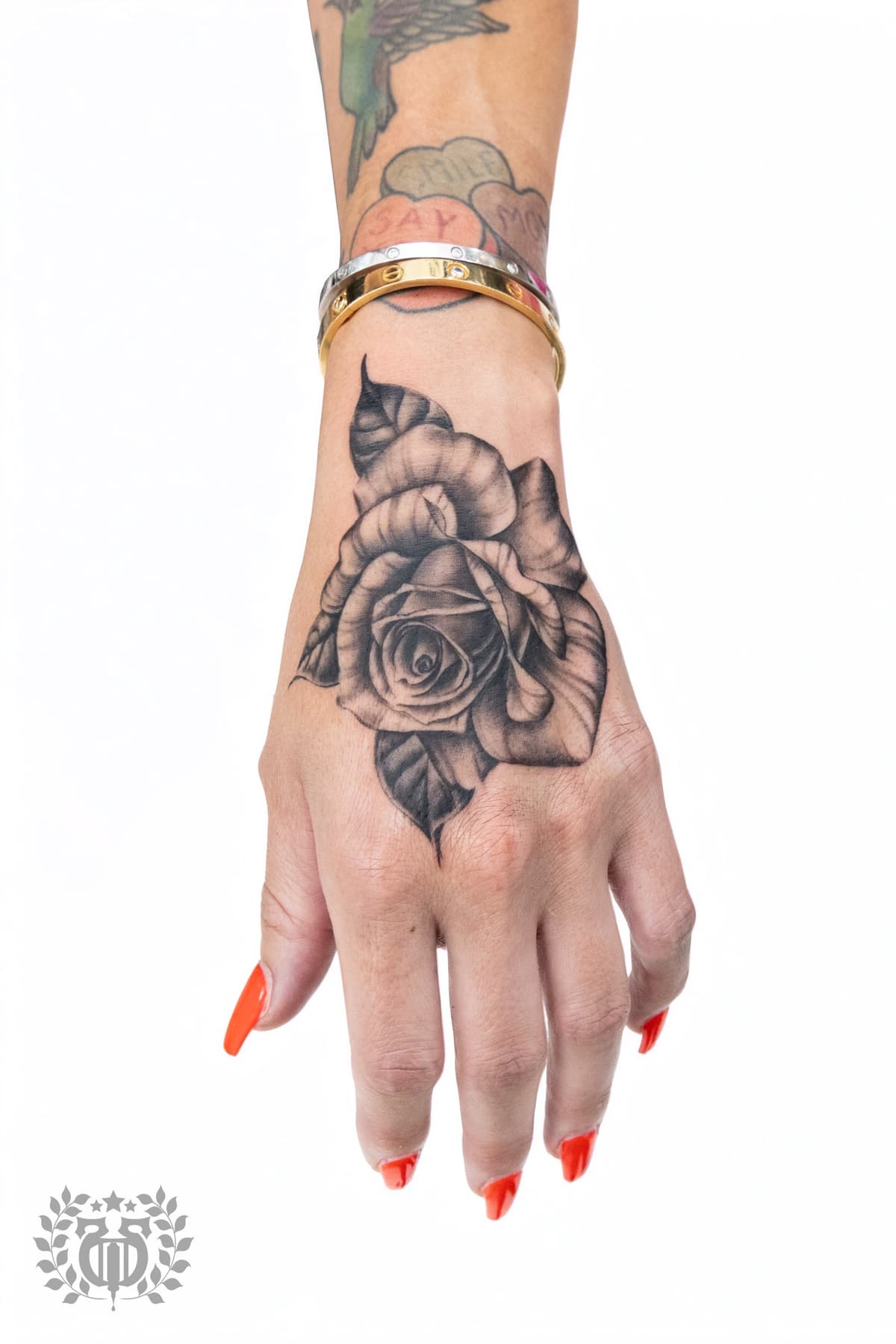 Black and grey realistic rose realism tattoo on hand in Los Angeles