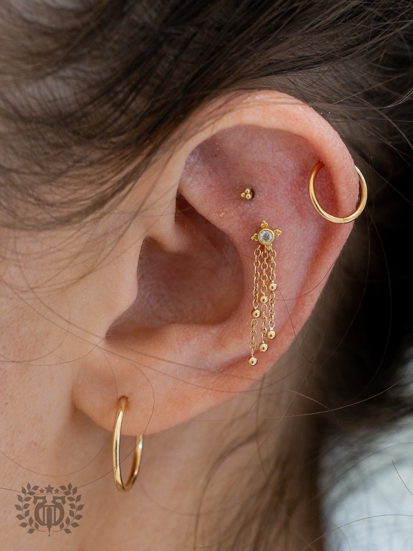 Curated ear piercing at Apollo Studio Los Angeles