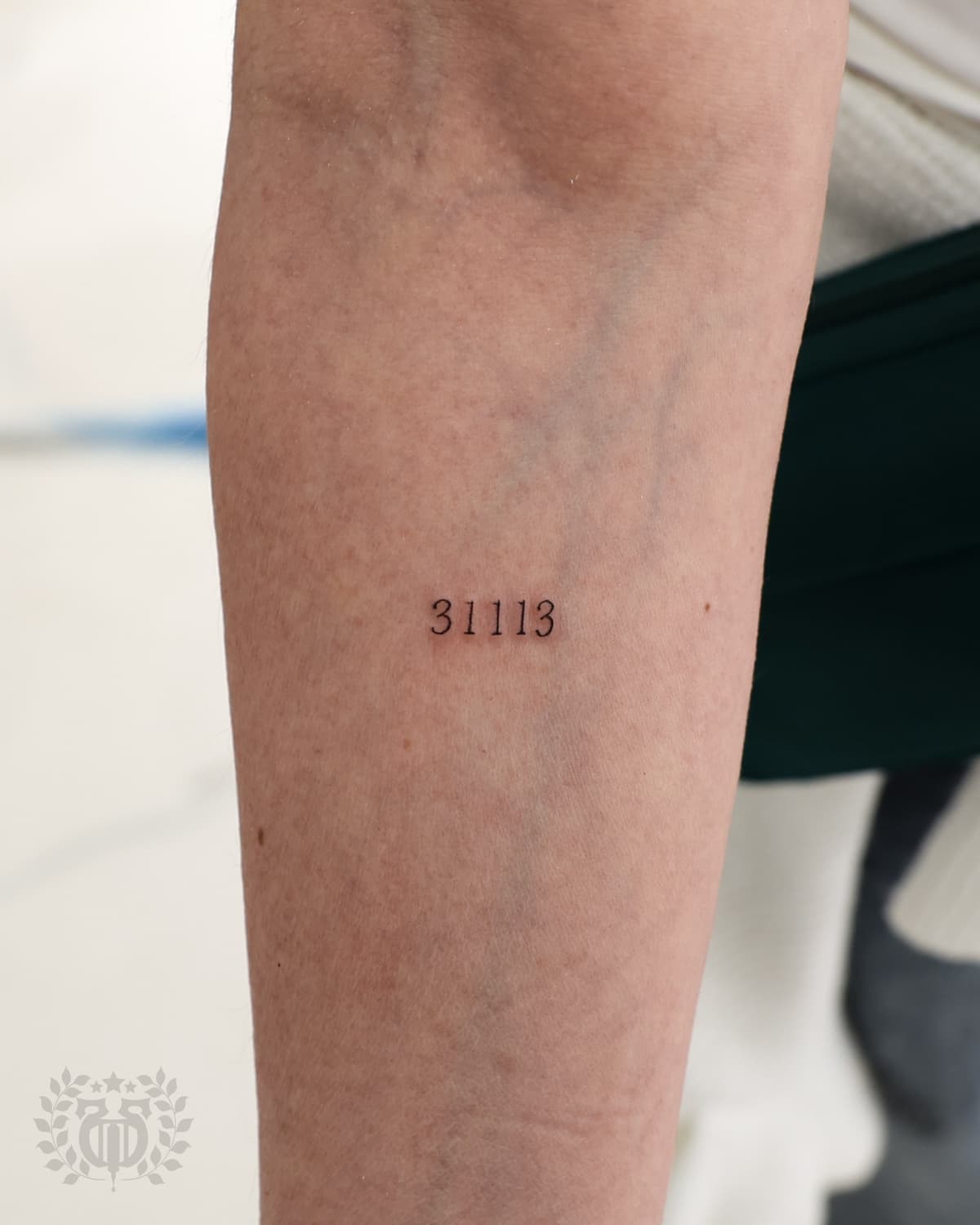 Minimalist fine-line tattoo at Apollo Studio Los Angeles